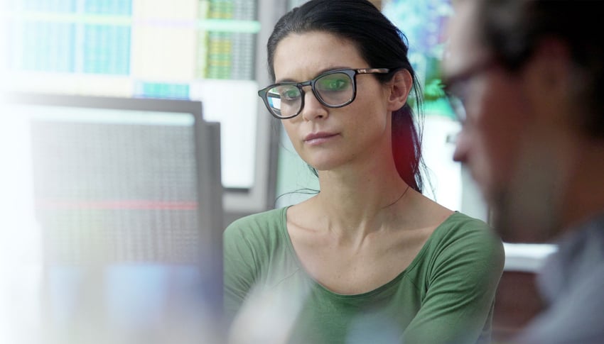 Analyst looking at computer screen