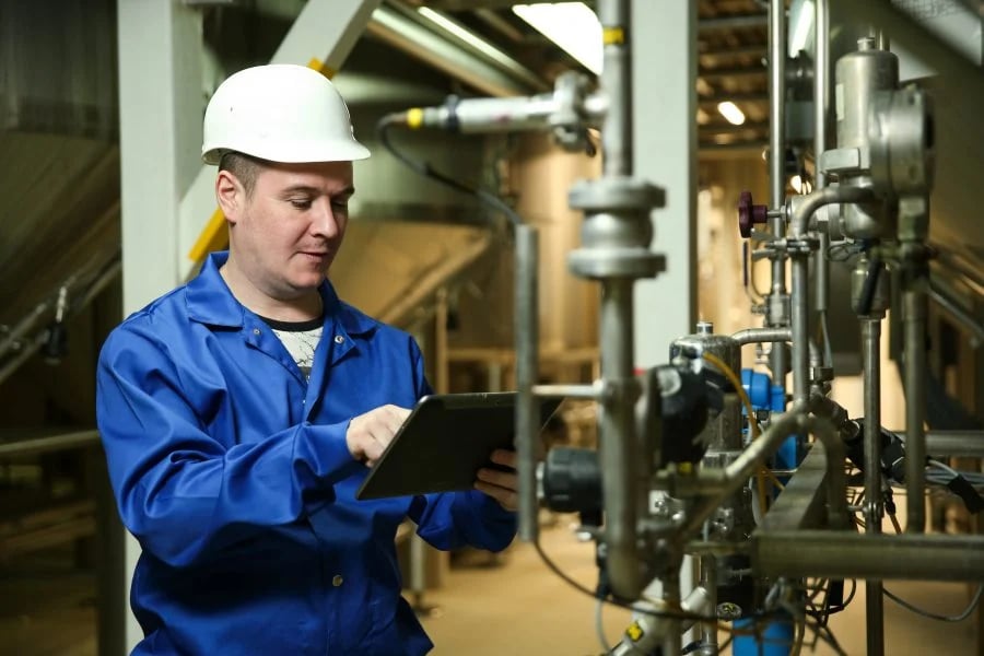 Employee pointing at tablet