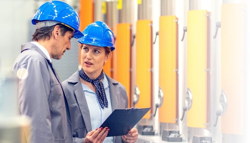 Engineers discussing findings