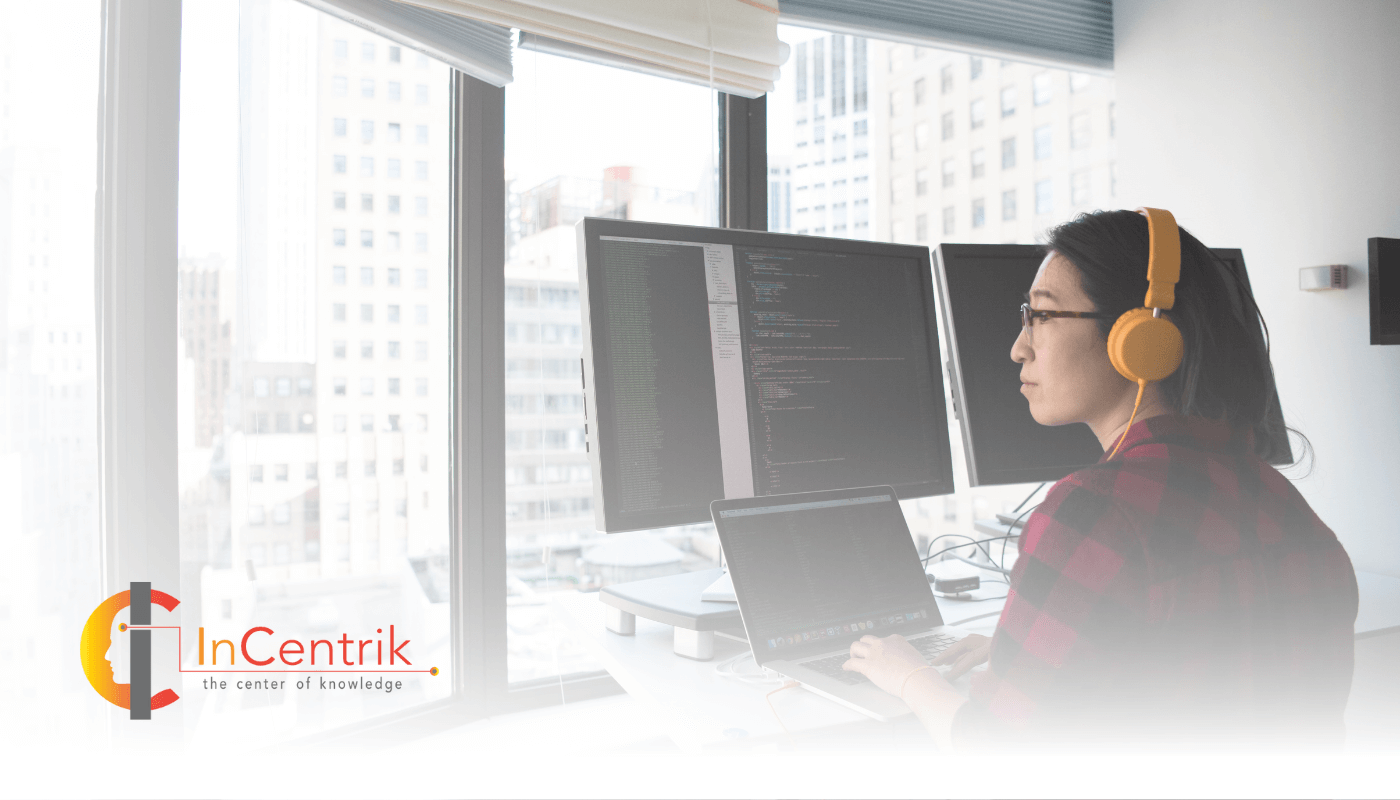 A systems engineer for Incentrik using a computer with multiple monitors  (1) (1)